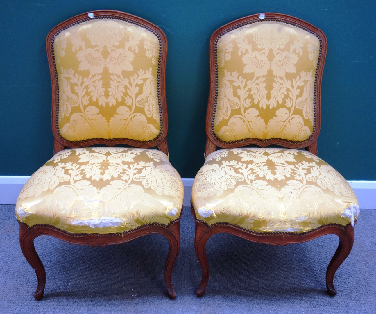 Appraisal: A pair of Louis XV walnut framed serpentine seated side