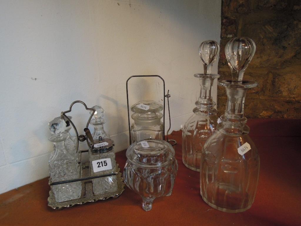 Appraisal: A pair of th century double ring neck decanters and