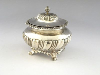 Appraisal: An Edwardian silver tea caddy of oval bellied form part