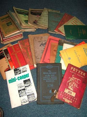 Appraisal: A QUANTITY OF EARLY TH CENTURY CAR MANUALS maps etc