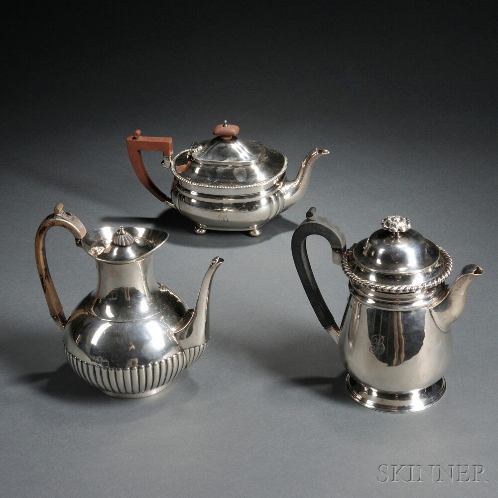 Appraisal: Three English Sterling Silver Tea and Coffeepots two London a