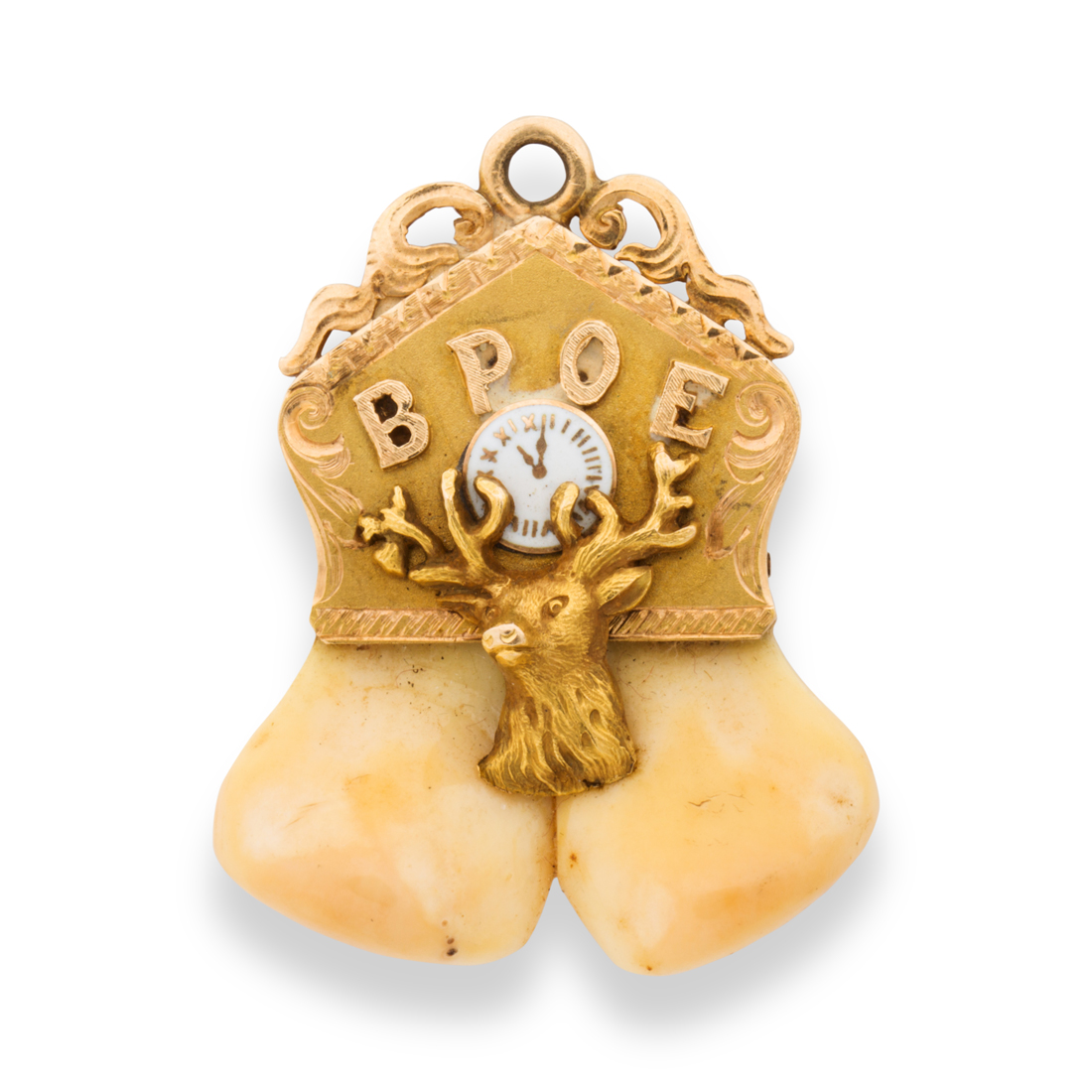 Appraisal: AN ENAMEL ELK'S TEETH AND FOURTEEN KARAT GOLD PENDANT An