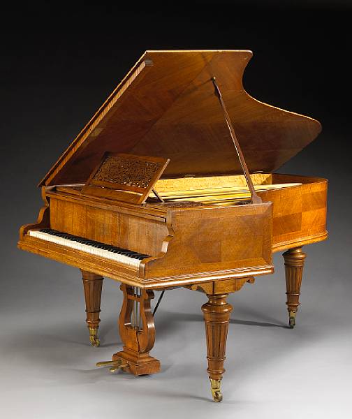 Appraisal: An Erard walnut piano serial Paris circa length ft