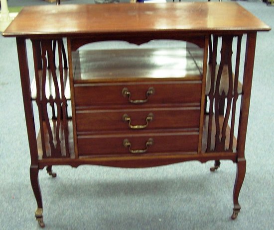 Appraisal: An Edwardian mahogany music cabinet fitted three drawers with fall