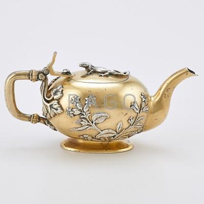 Appraisal: RUSSIAN JAPANESQUE PARCEL GILT SILVER TEAPOT Oblate gilt vessel on