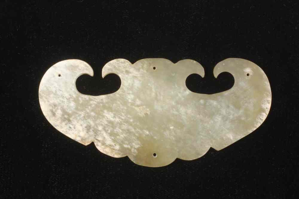 Appraisal: EARLY CHINESE JADE PLAQUE- pale celadon to chicken bone jade