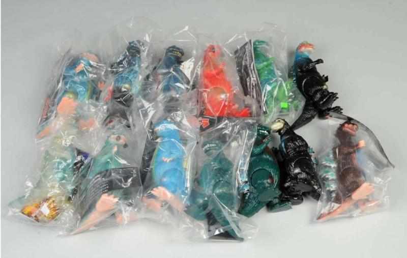 Appraisal: Lot of Godzilla Soft Vinyl Figures Description Thirteen standard size