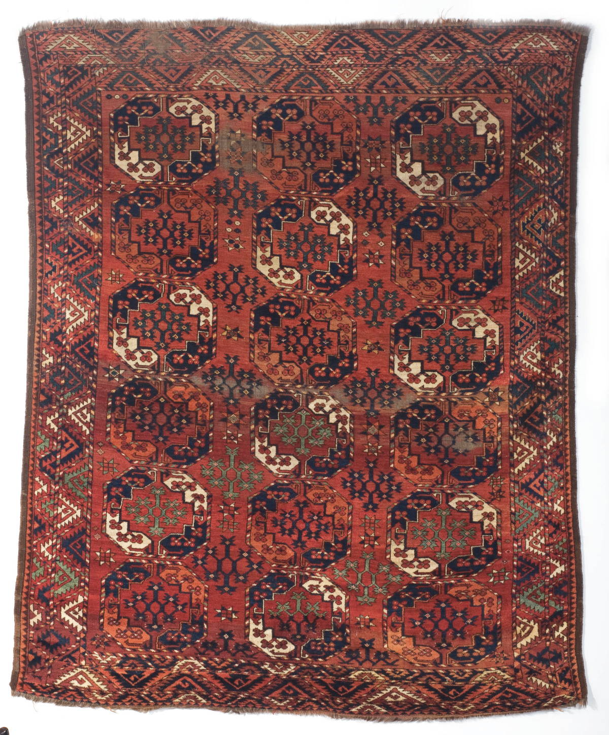 Appraisal: ERSARI MAIN CARPET WEST TURKMENISTAN LATE NINETEENTH CENTURY The brown-red