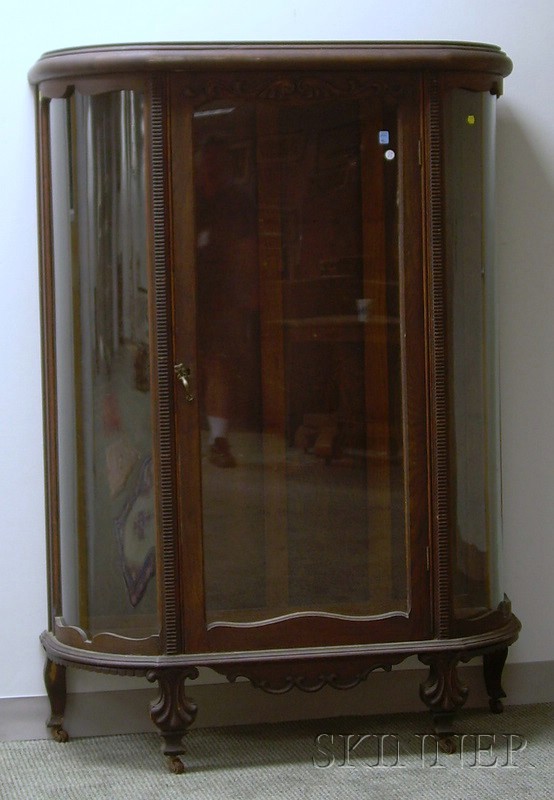 Appraisal: Early th Century Carved Oak D-shaped China Cabinet the interior