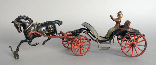 Appraisal: Cast iron horse drawn phaeton late th c with a