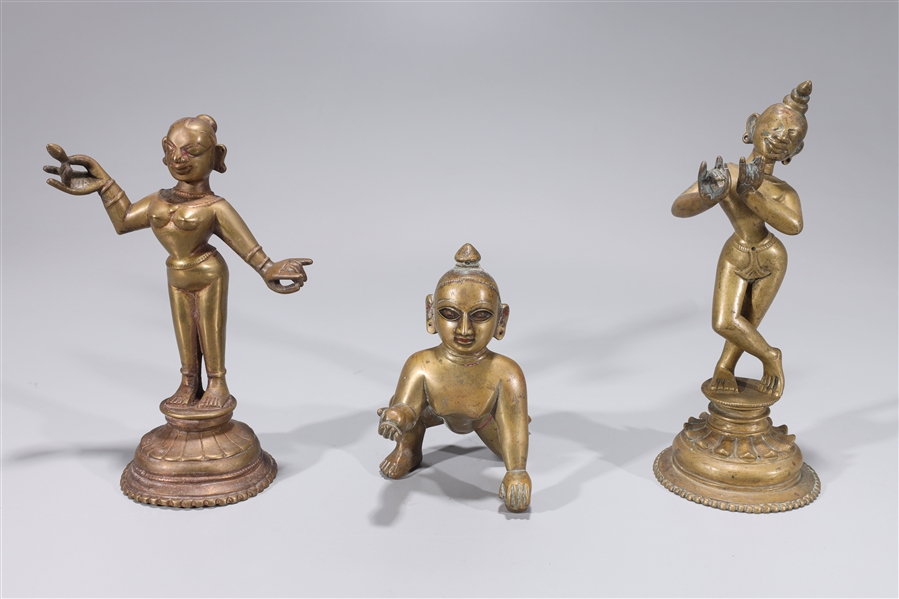 Appraisal: Group of three Indian bronze statues including two standing figures