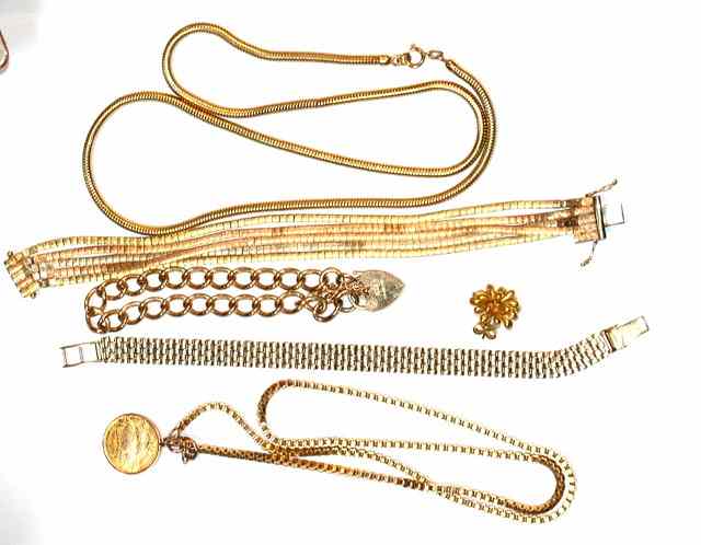 Appraisal: THREE CT GOLD BRACELETS and two gold necklaces one with