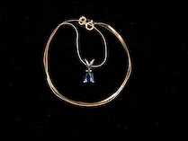 Appraisal: A Yellow Gold Pendant Set With A Sapphire A K