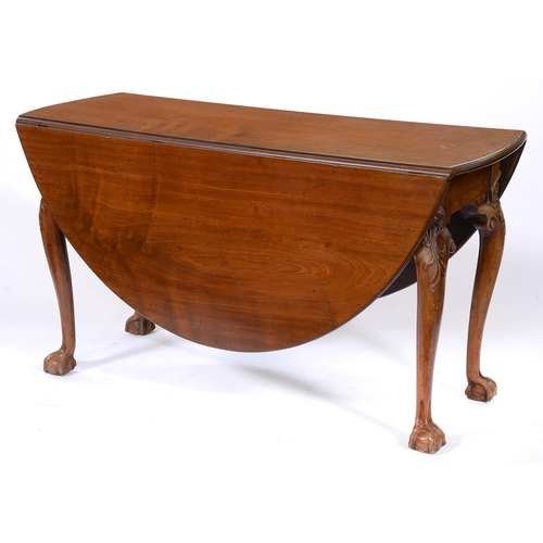 Appraisal: A George II mahogany gateleg table on carved cabriole legs