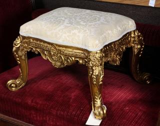 Appraisal: Rococo style giltwood carved vanity bench Rococo style giltwood carved