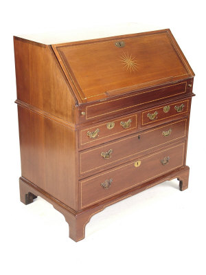 Appraisal: A George III mahogany bureau circa the star inlaid fall