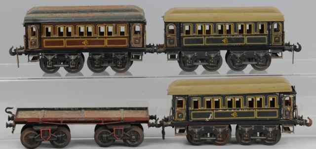 Appraisal: THREE CARETTE PASSENGERS CARS AND BING FLAT CAR Matching cars