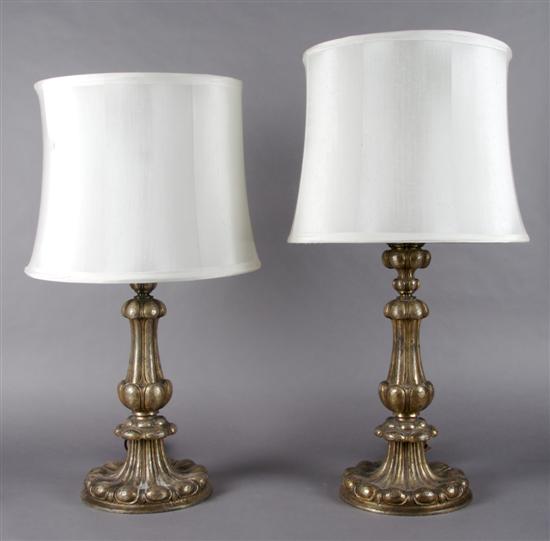 Appraisal: A Pair of Silvered Metal Lamps Height overall inches