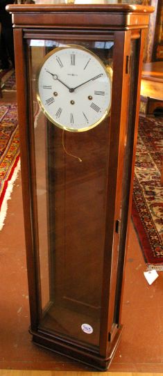 Appraisal: Modern Howard Miller Two-Weight Regulator Wall Clock the cherrywood case