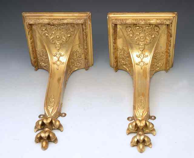 Appraisal: A PAIR OF ANTIQUE GILT WALL BRACKETS the square tops