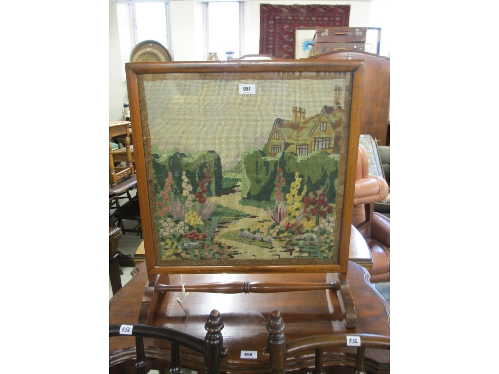 Appraisal: Mahogany firescreen with an embroidered panel