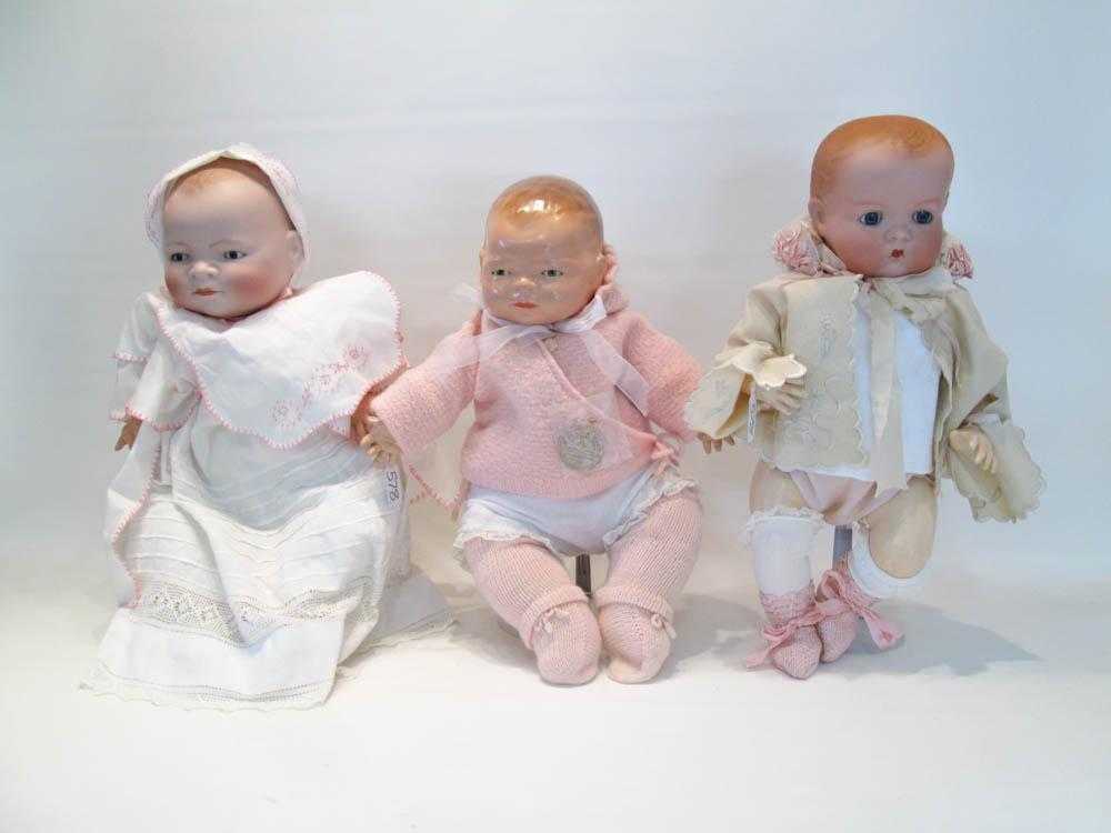 Appraisal: THREE GERMAN BABY DOLLS the first Baby-By-Lo with bisque head