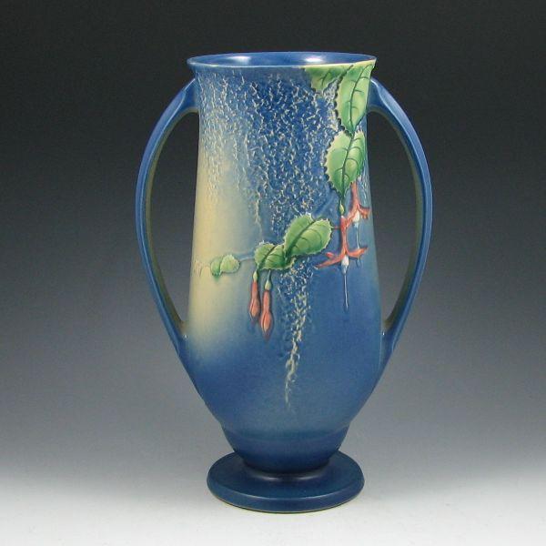 Appraisal: Roseville blue Fuchsia handled vase with good mold and color