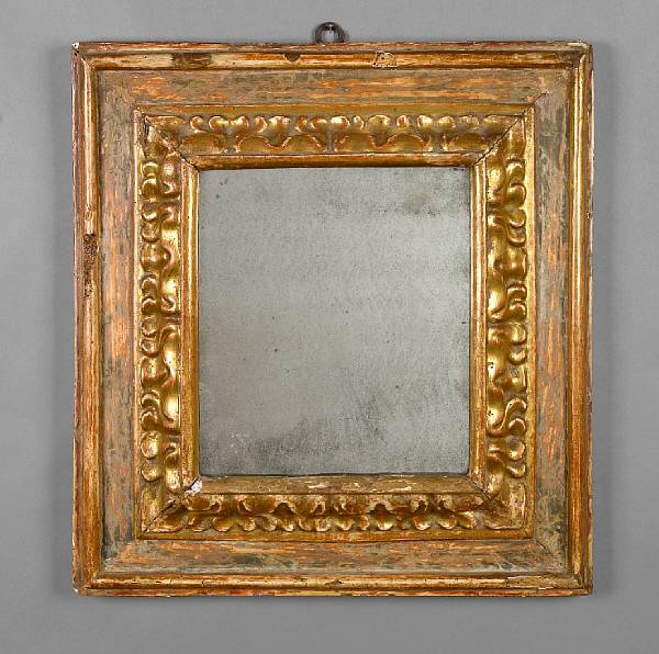 Appraisal: An Italian Baroque parcel gilt and paint decorated mirror first