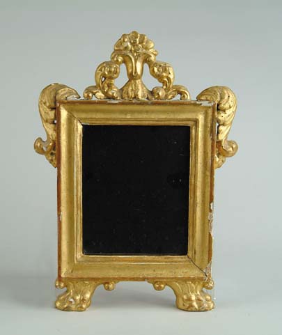 Appraisal: SMALL CONTINENTAL GILT WOOD CARVED MIRROR Rectangular mirror has molded