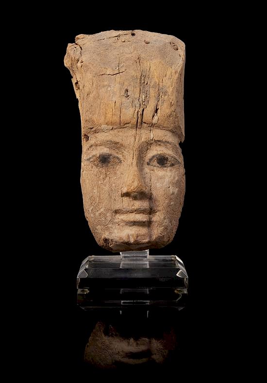 Appraisal: An Egyptian Painted Wood Mummy Mask Height inches An Egyptian