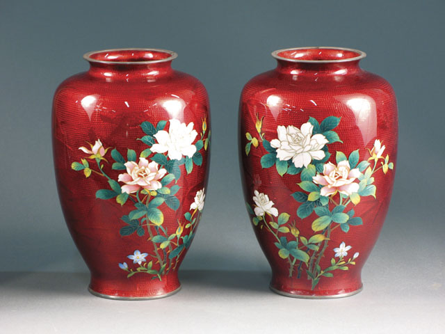 Appraisal: PAIR JAPANESE CLOISONNE VASES having colorful floral decoration on one