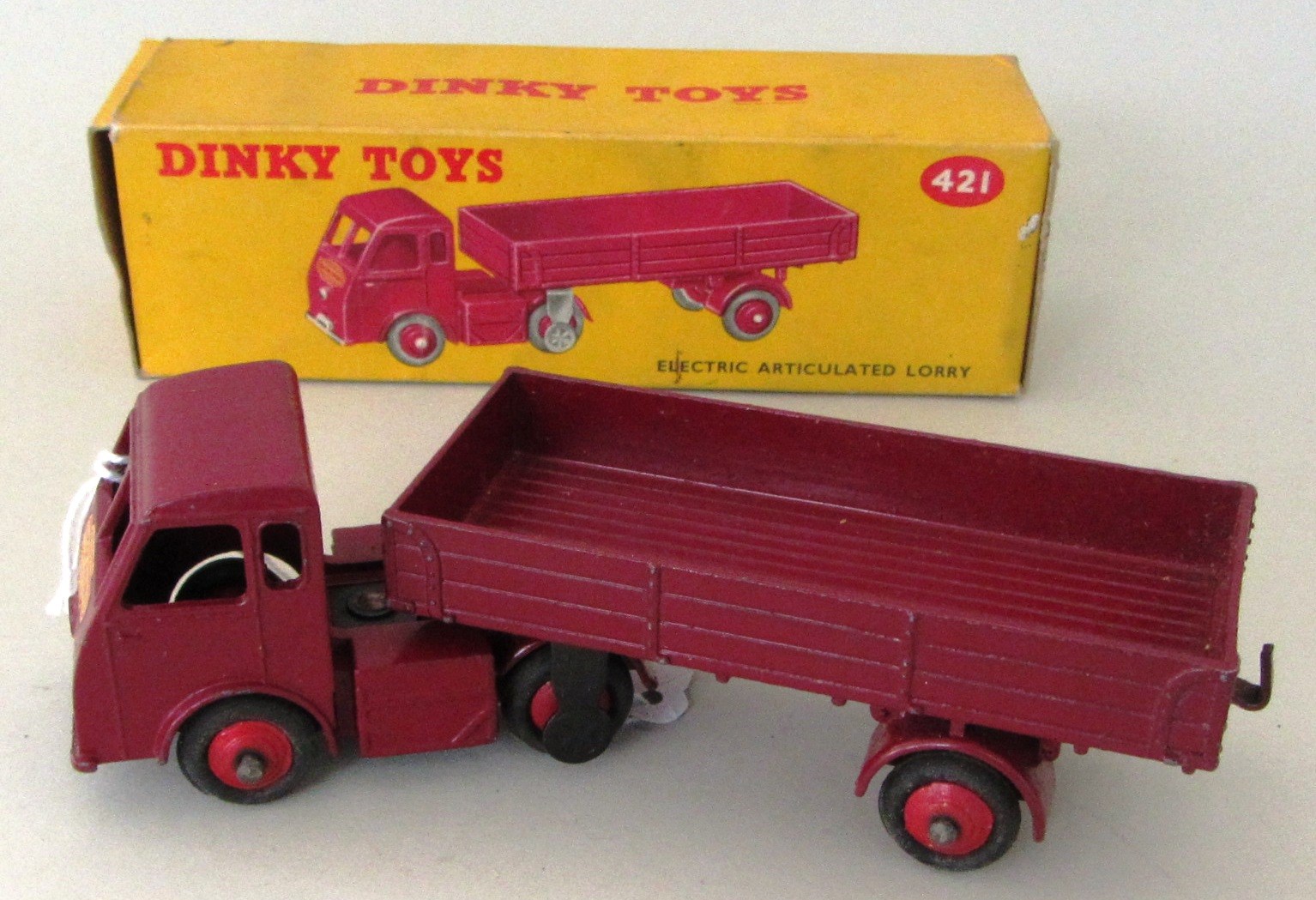 Appraisal: A Dinky Electric Articulated lorry maroon livery boxed