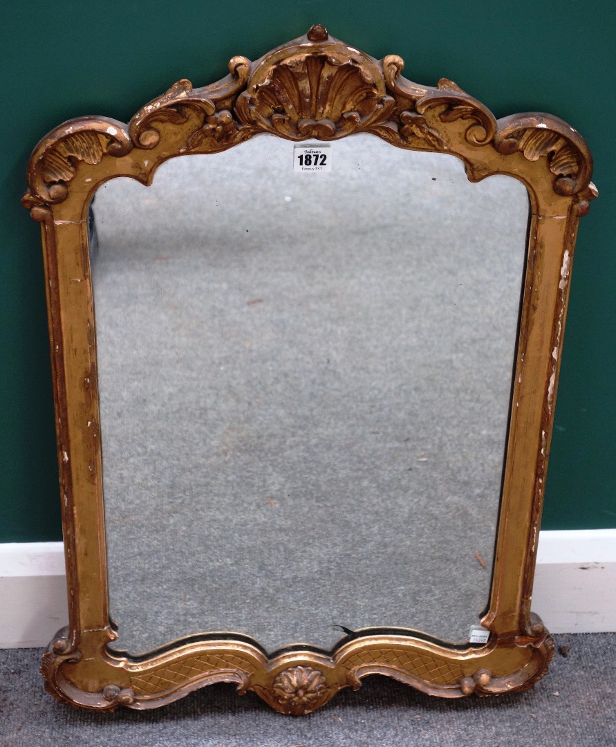 Appraisal: A th century gilt framed mirror with shell moulded crest