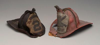 Appraisal: Two th century fire helmets both with eagle mounts at