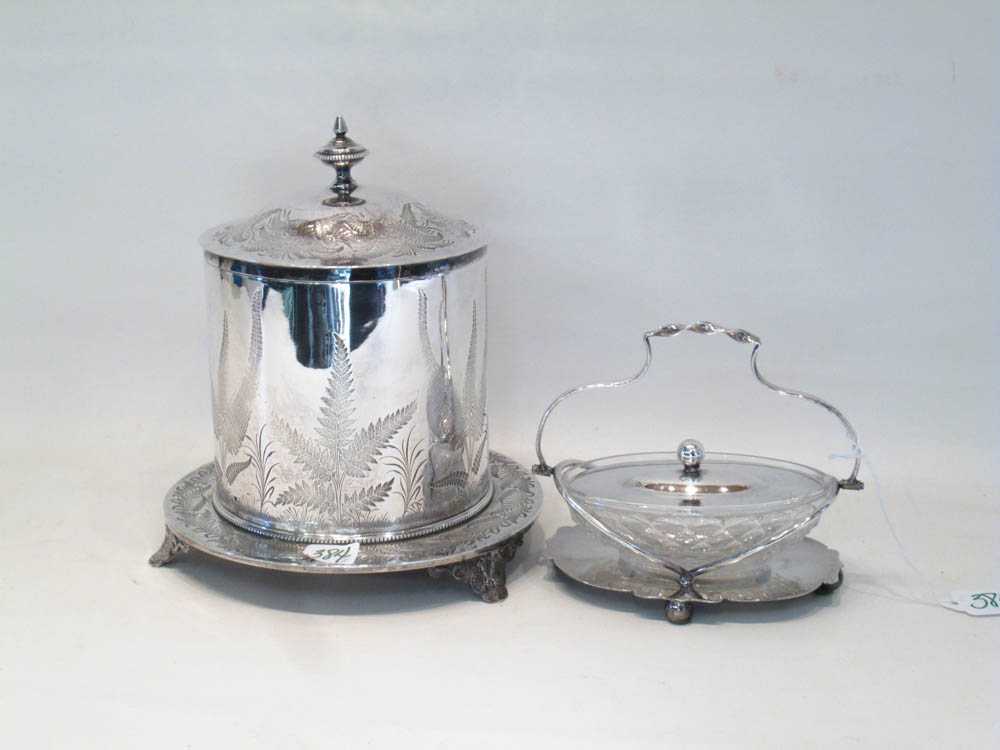 Appraisal: A SILVER PLATED TEA CADDY AND SERVING DISH The footed