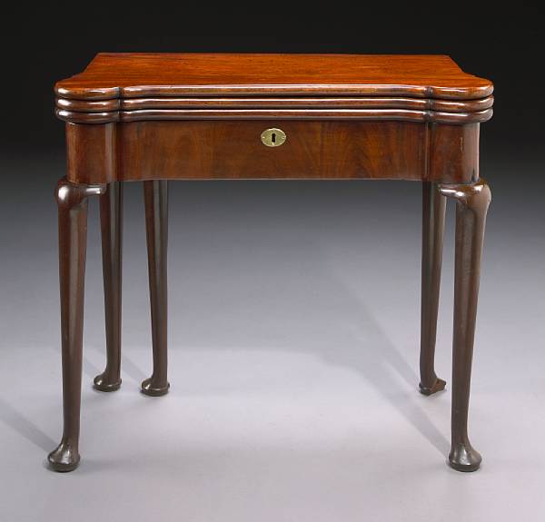 Appraisal: A George II mahogany triple top games and tea table