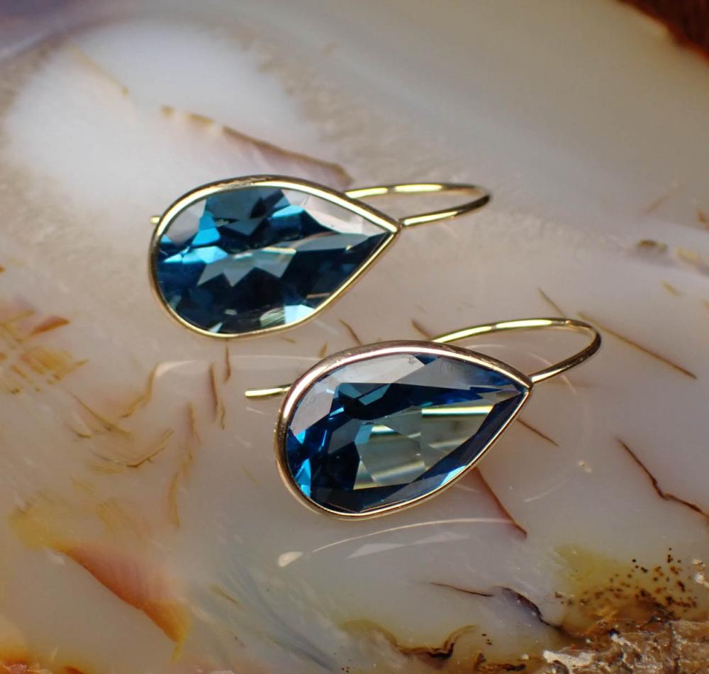 Appraisal: PAIR OF LAURA RAMSEY BLUE TOPAZ EARRINGS each k yellow