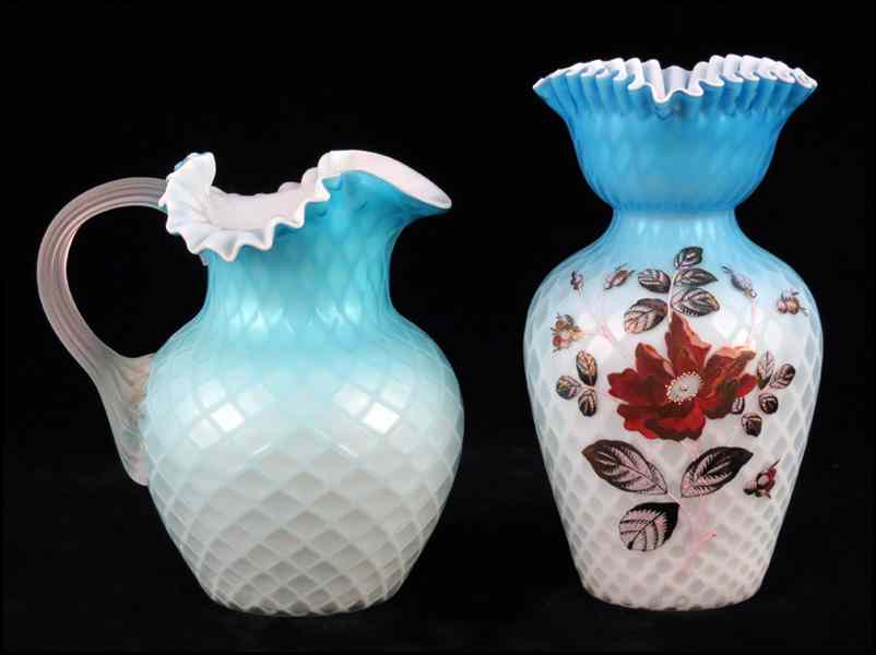 Appraisal: QUILTED BLUE SATIN GLASS PITCHER Bearing a ruffled neck Together