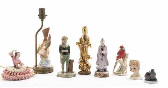 Appraisal: A Collection of Fourteen Porcelain Figures comprising a geisha a