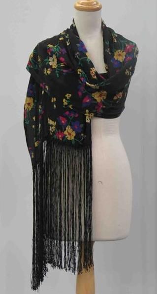 Appraisal: Fringed shawl in floral printed black silk circa Provenance Peter