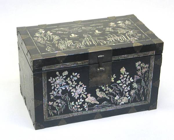 Appraisal: A Korean black lacquered wood hinged box with mother-of-pearl inlay