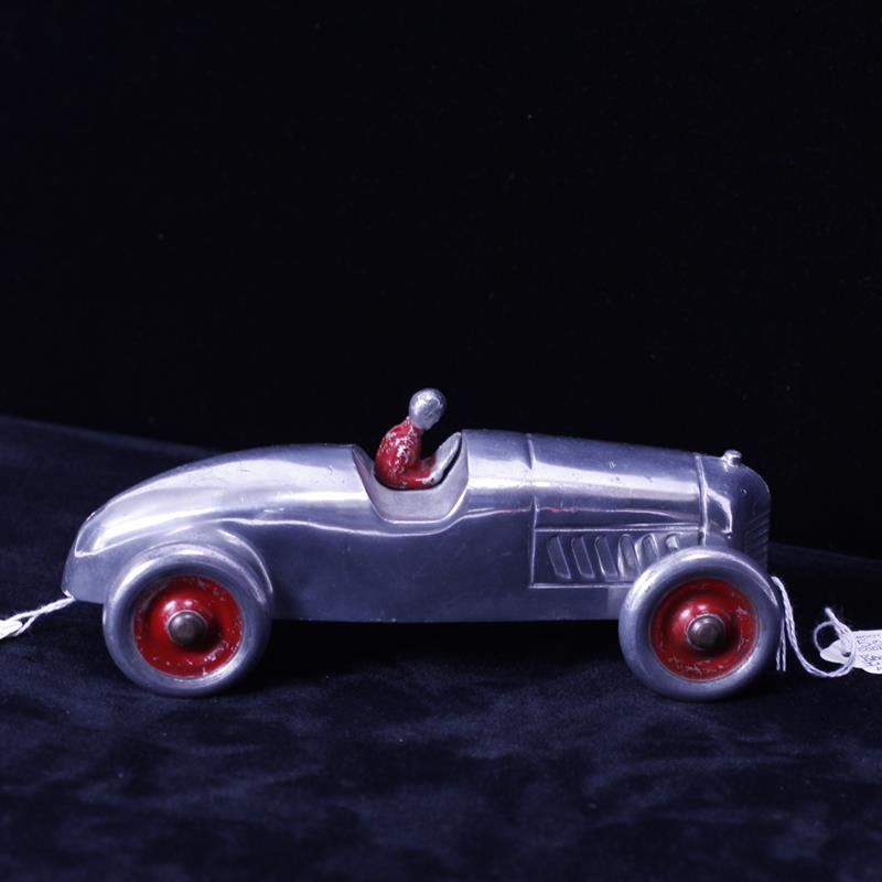 Appraisal: Aluminum Pull Racer with driver Manufactured by Aluminum Industries Co