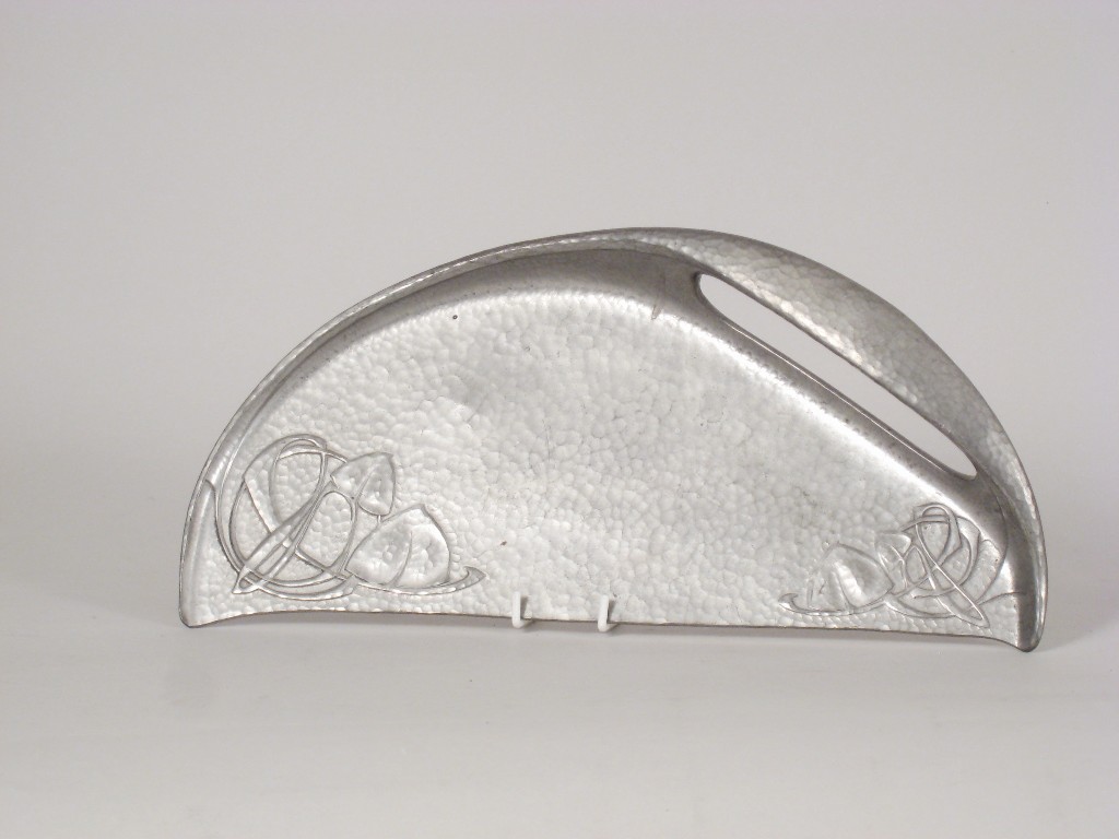 Appraisal: A Tudric pewter Art Nouveau Crumb Tray with hammered and