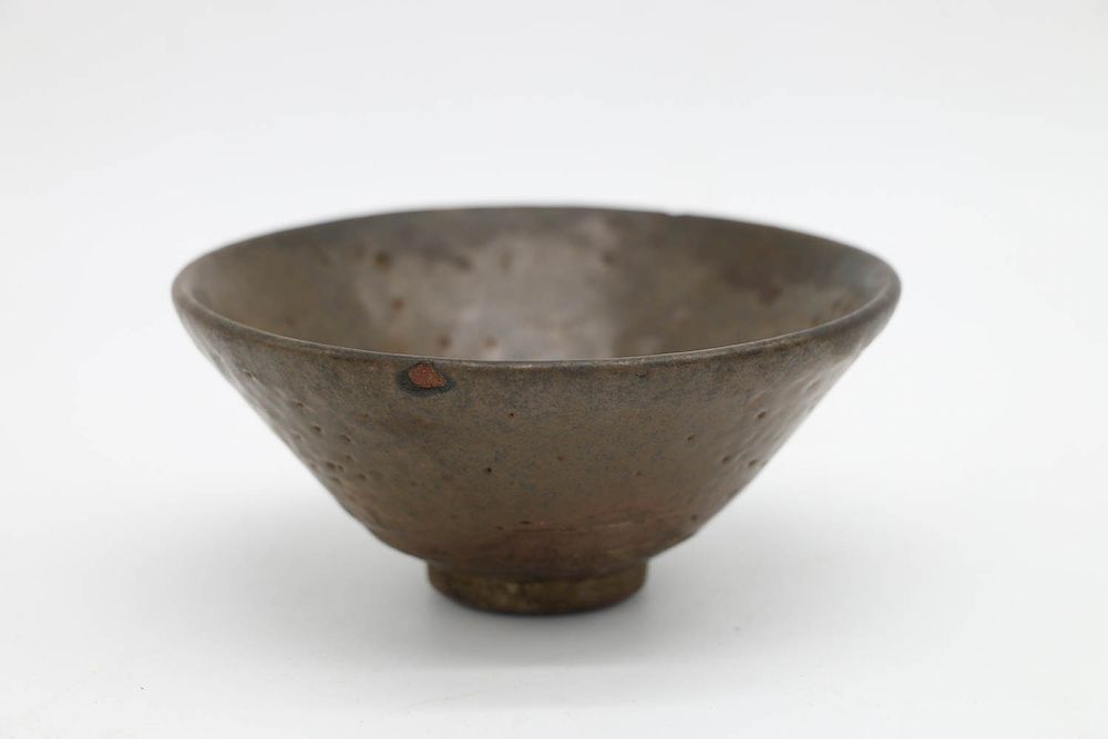 Appraisal: JIAN TEA BOWL Of tapering body covered in brownish-black glaze