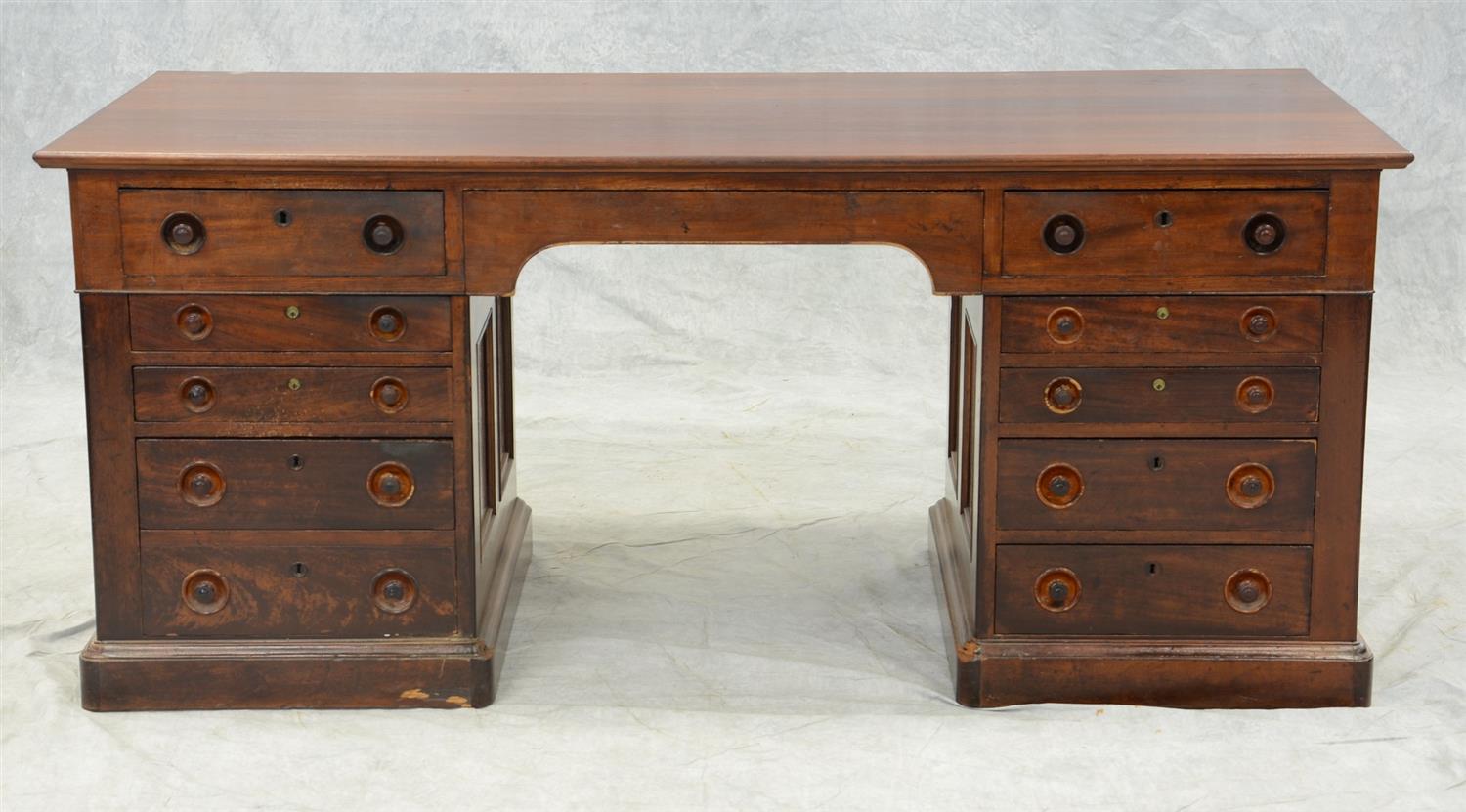 Appraisal: Mahogany Victorian -part kneehole desk solid molded top over an