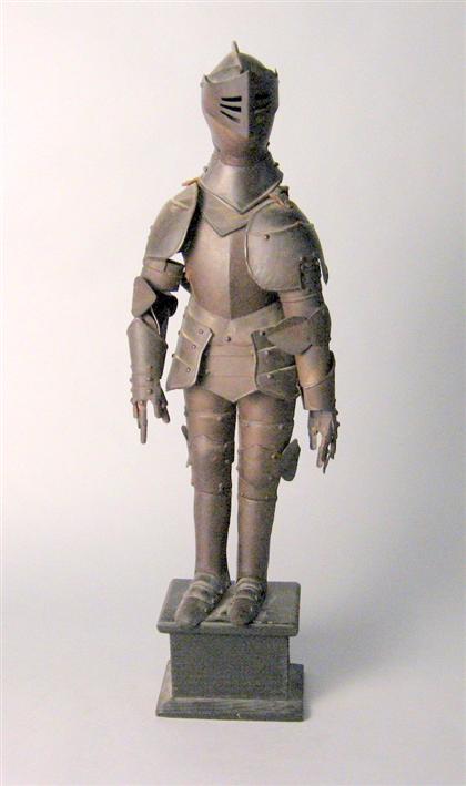 Appraisal: Continental miniature suit of armor th century Raised on a