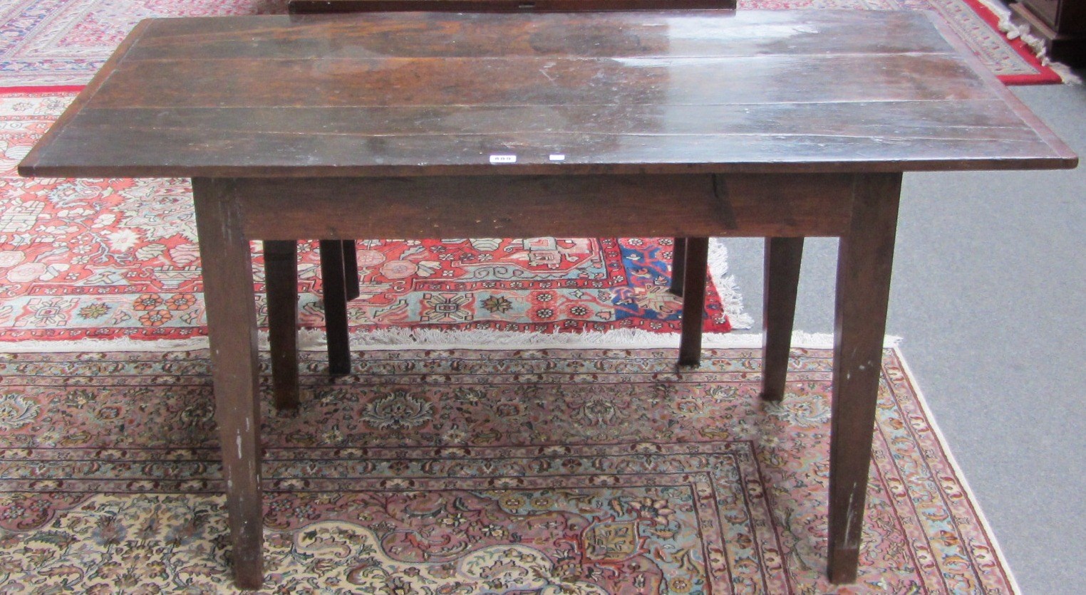 Appraisal: An th century and later oak table the cleated plank