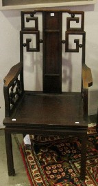 Appraisal: A Chinese rosewood high back armchair with carved sections to