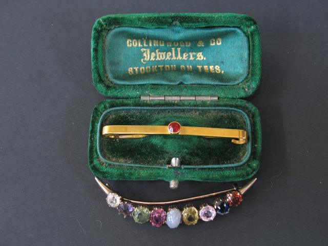 Appraisal: A VICTORIAN CRESCENT BROOCH claw-set with nine different graduated stones