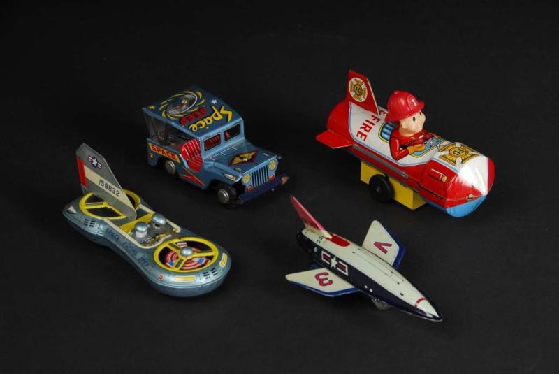 Appraisal: Lot of Tin Space Friction Wind-Up Toys Description Japanese All